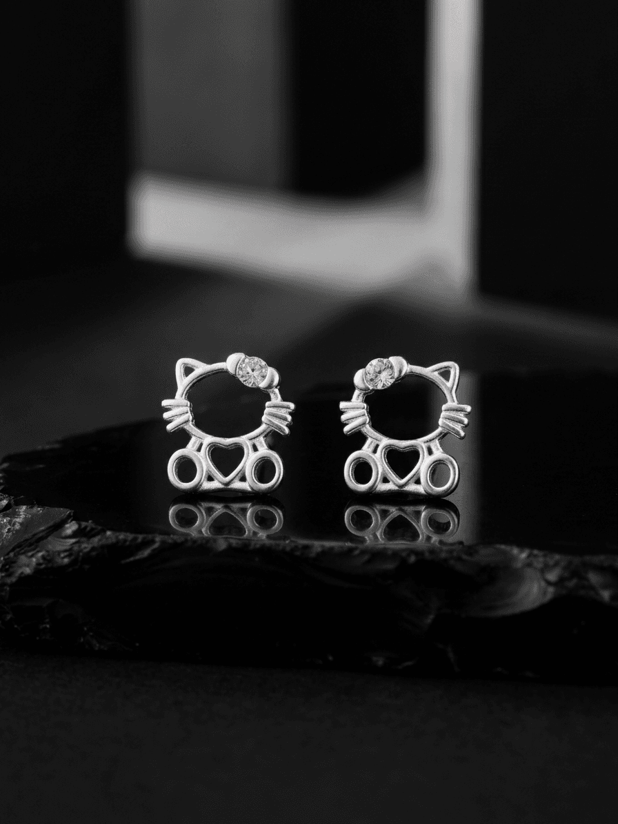 Aretes Silueta Hello Kitty joyería artesanal Yupana Sangolquí Ecuador